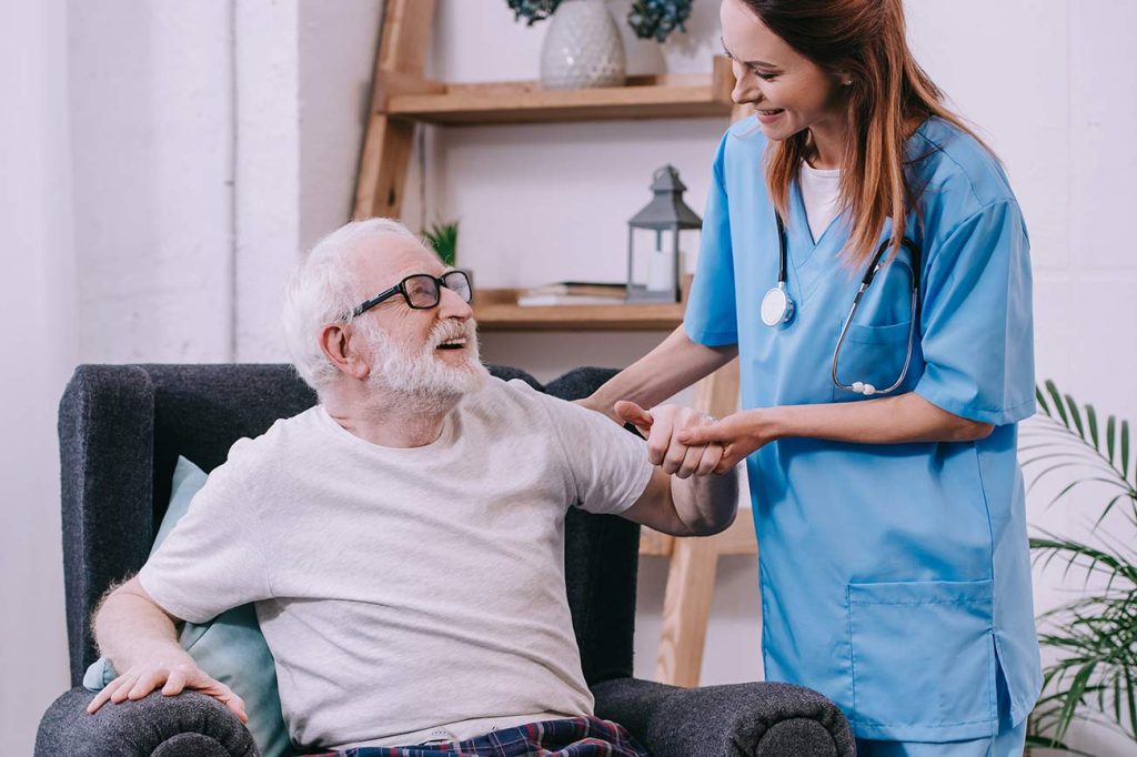 nurse helping resident